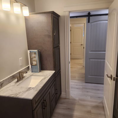 dark brown painted bathroom cabinets