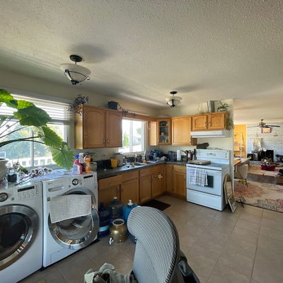 closet shelving that has been painted white with wood floor