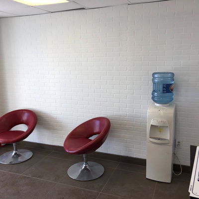 white painted brick wall