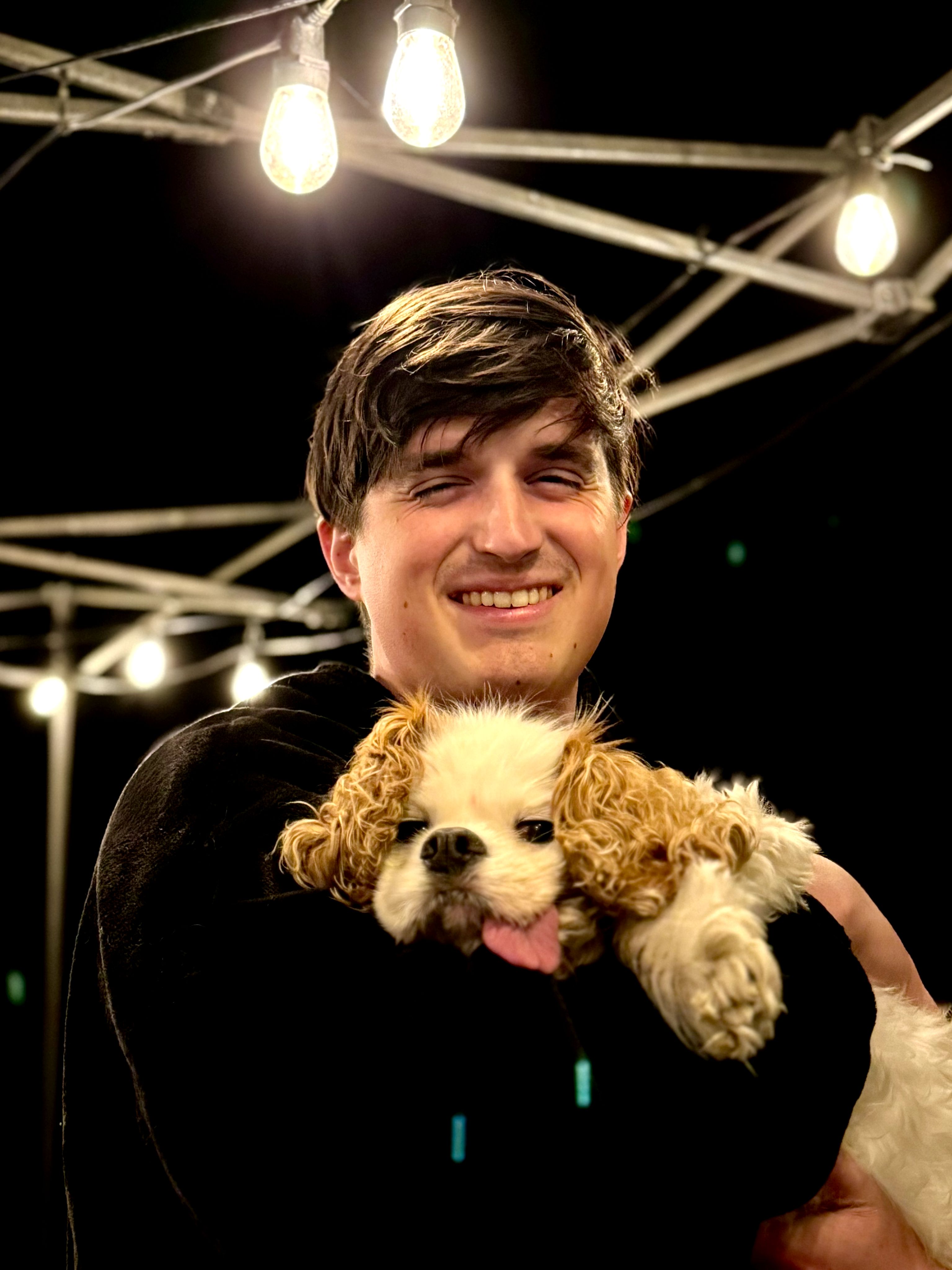 Self portrait of me holding an old king charles spaniel